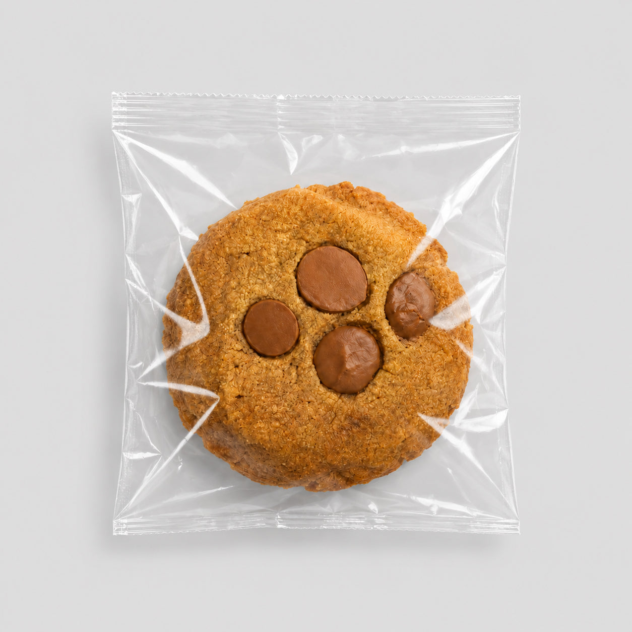 Chocolate-flavored THC cookie in clear packaging from Happyflower