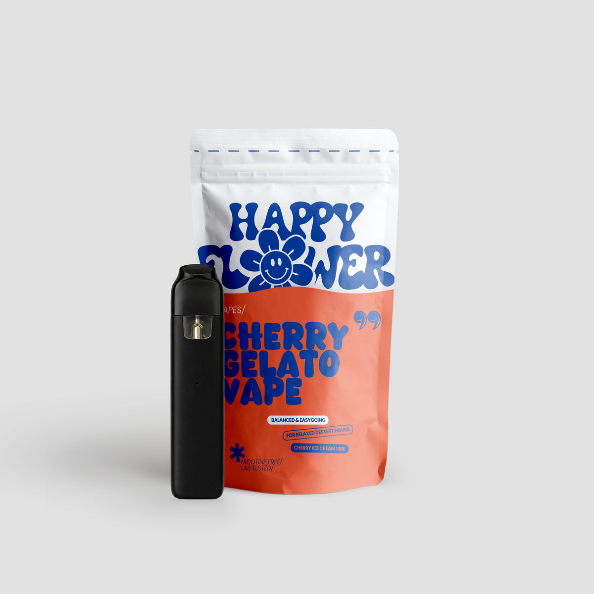 Happy Flower Cherry Gelato Vape mit weiß-korallfarbener Standbeutel-Verpackung und schwarzem Vape-Gerät auf hellem Hintergrund.
