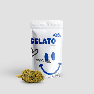 Happy Flower Gelato CBD Flowers in weißer Standbeutel-Verpackung mit einer großen Cannabisblüte im Vordergrund auf hellem Hintergrund.