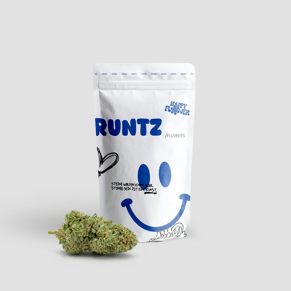 Happy Flower Runtz CBD Flowers in weißer Standbeutel-Verpackung mit zwei grünen Cannabisblüten im Vordergrund auf hellem Hintergrund.