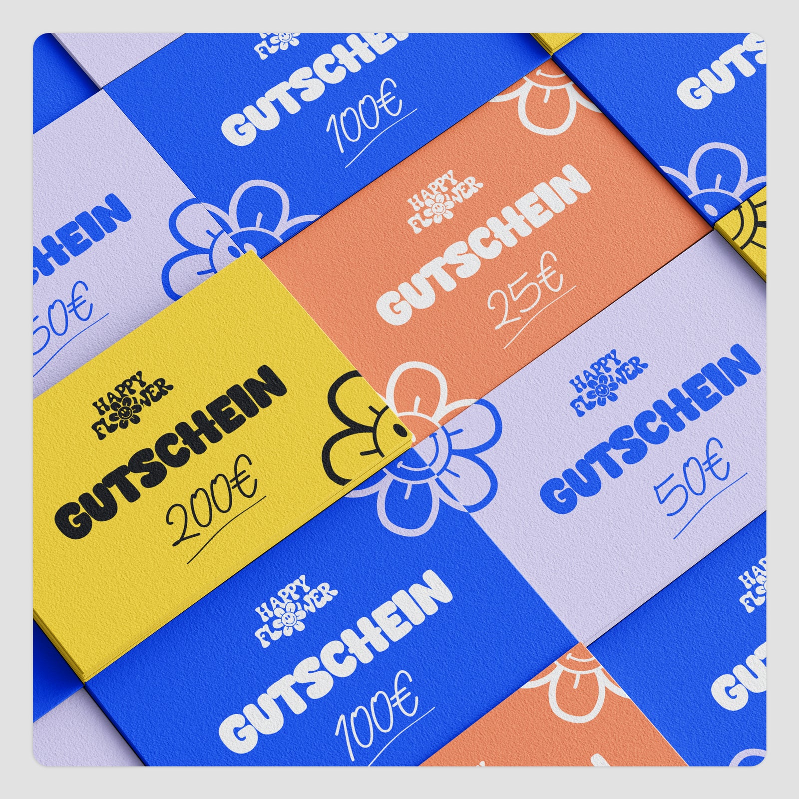 Tarjetas regalo «Happy Flower» dispuestas en superposición en azul, amarillo, albaricoque y lila claro, con motivos florales y importes de 25, 50, 100 y 200 euros.
